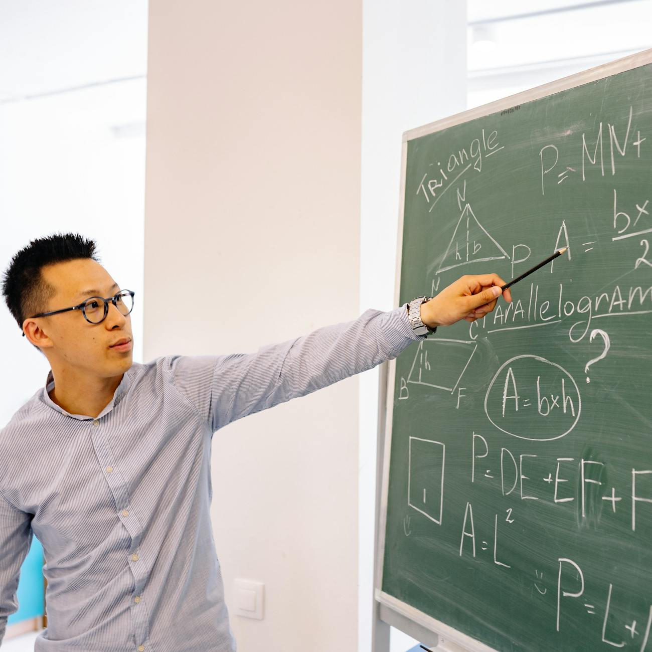 male teacher teaching a lesson