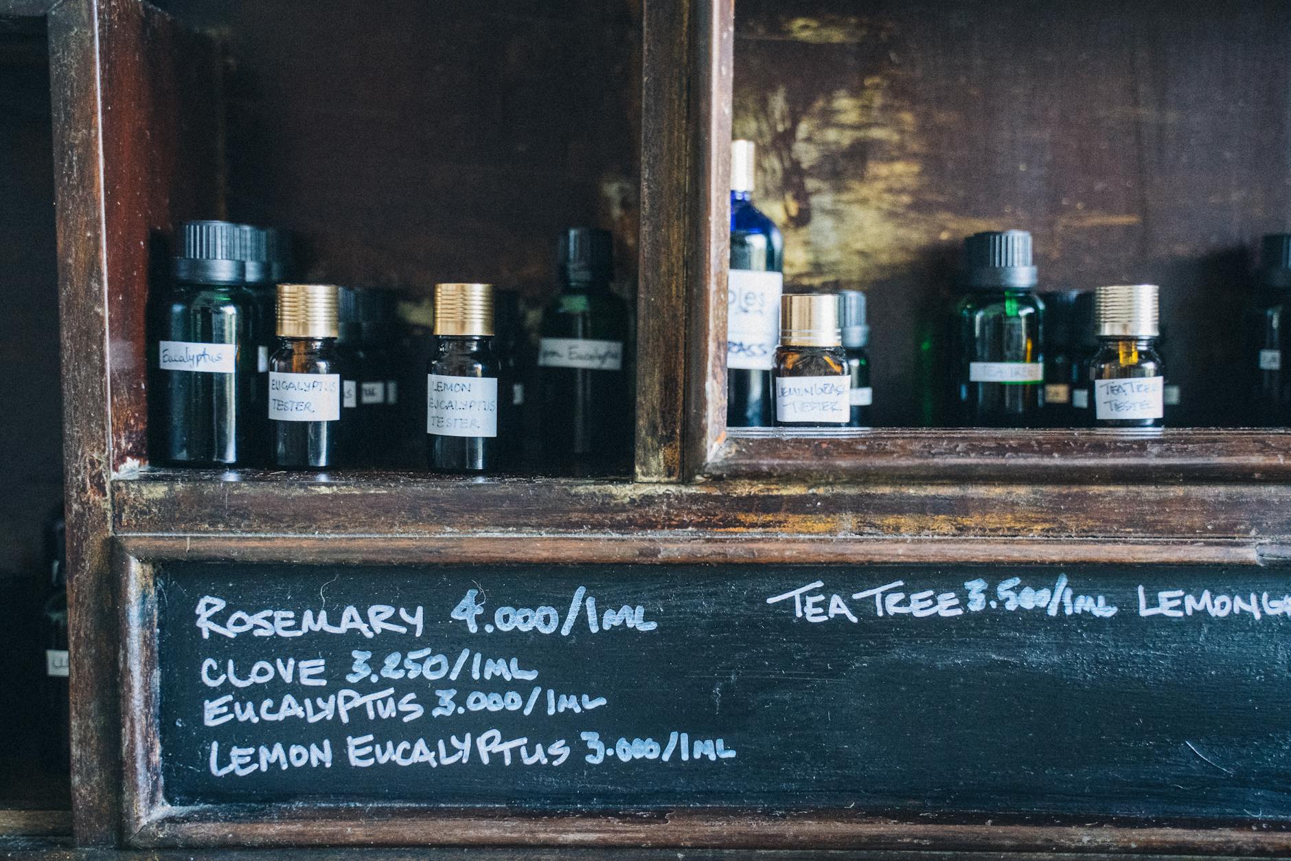 brown wooden shelf with bottles