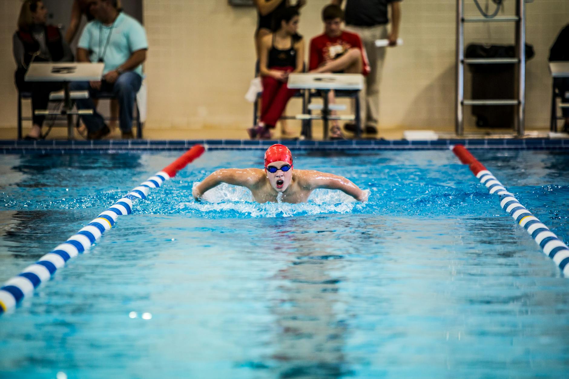 person swimming in pool