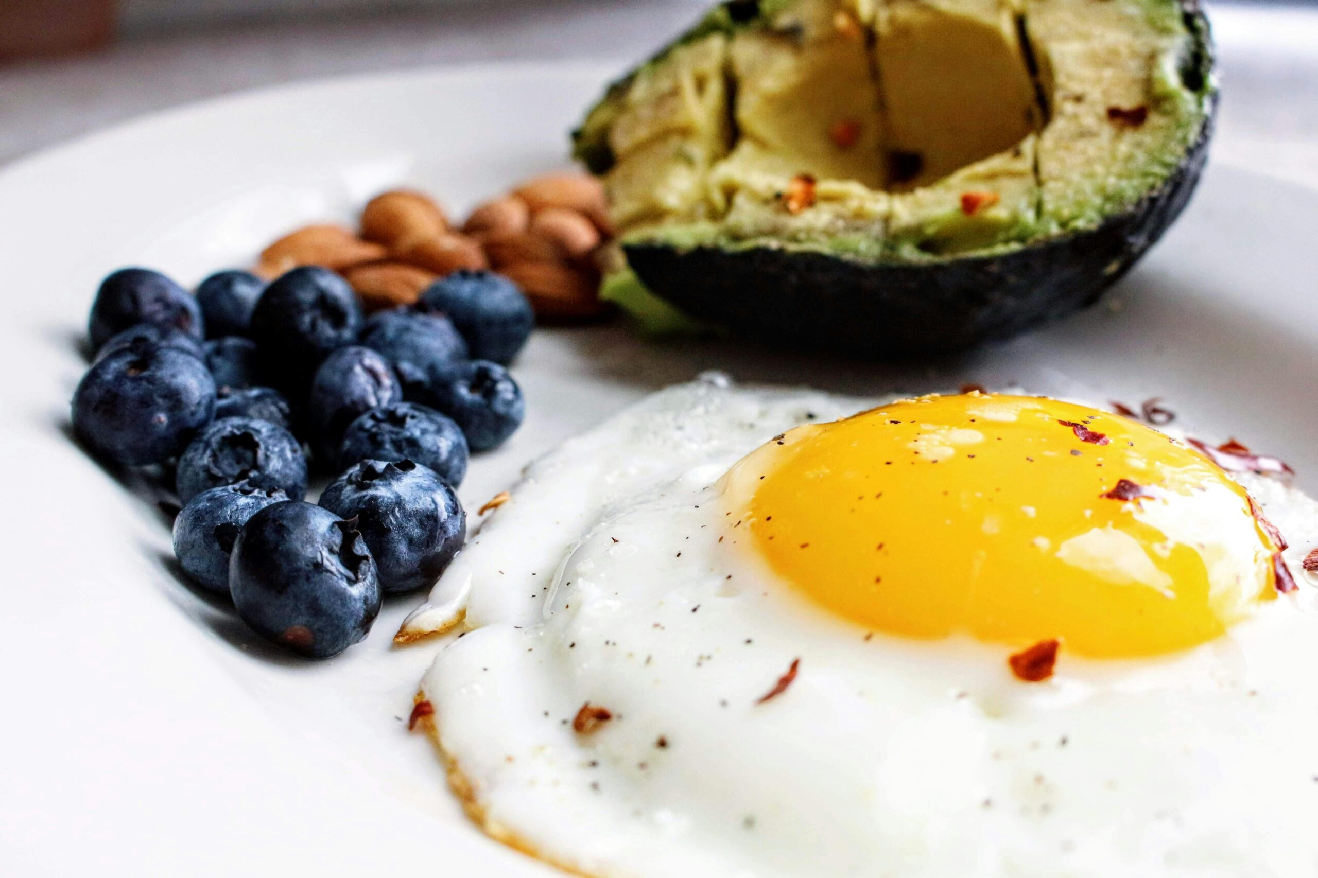 Egg near blueberries